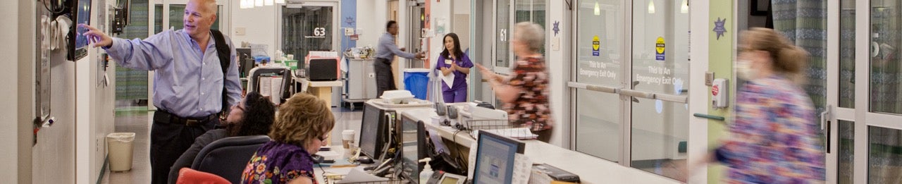 Staff in a hospital are busy working