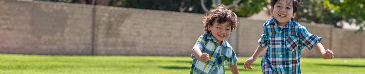 Two children play outside