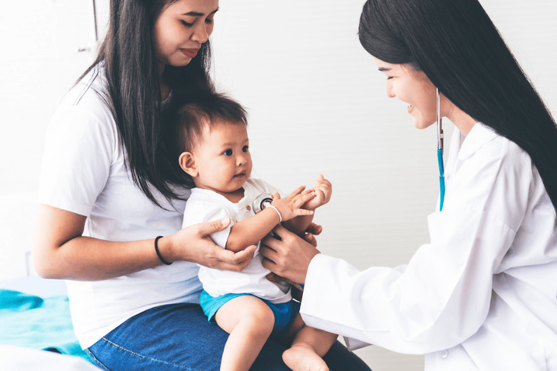 Pediatrician doing a checkup on a toddler