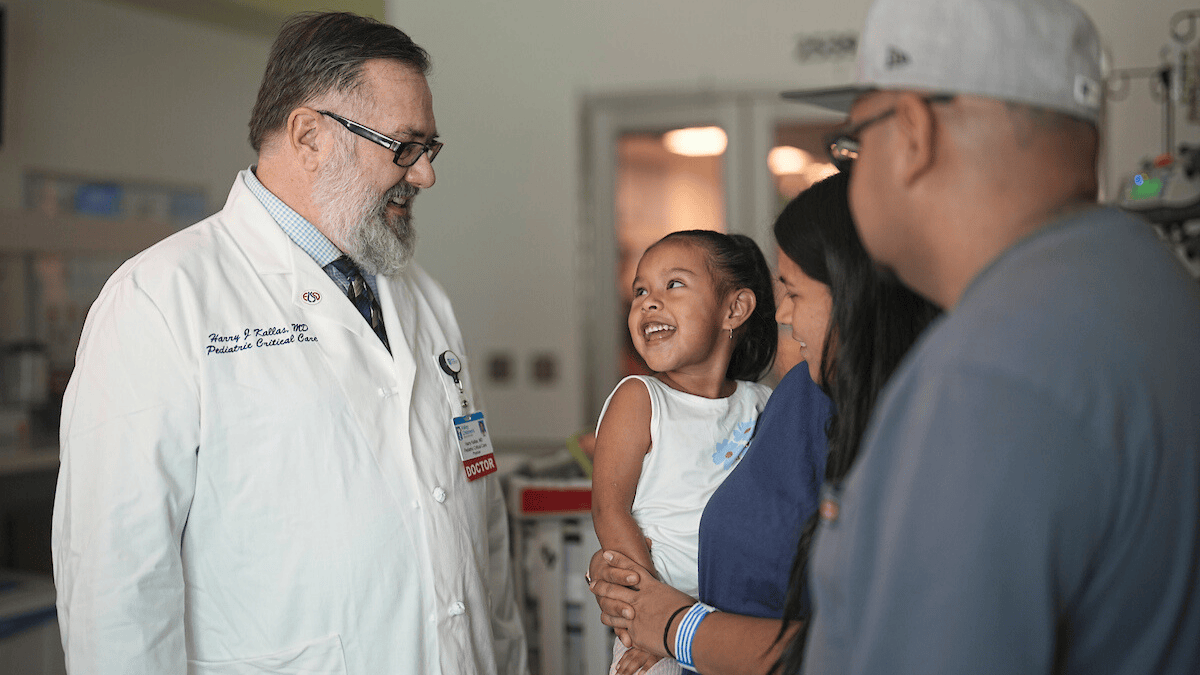 Physician speaking with a family