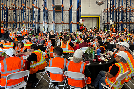 A group of POM Wonderful Employees sitting at an event