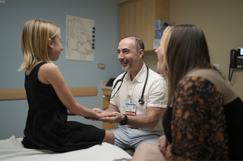 Dr. Miguel Restrepo consults with a family