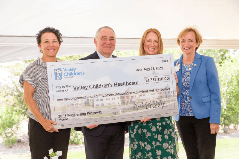 Valley Children's CEO Todd Suntrapak and Guild leadership accept a check from the Guilds supporting Valley Children's
