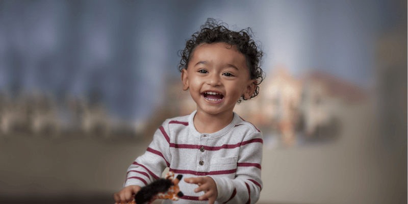 A little boy smiles