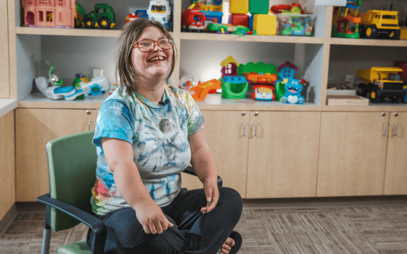 Blair smiles inside the Rehab Center Playroom at Valley Children's Hospital