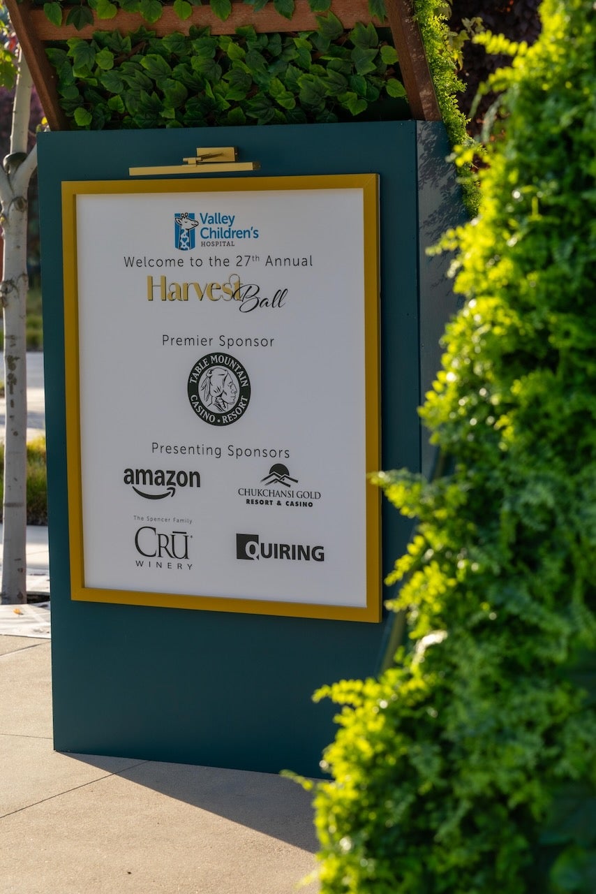 welcome sign with sponsor logos 