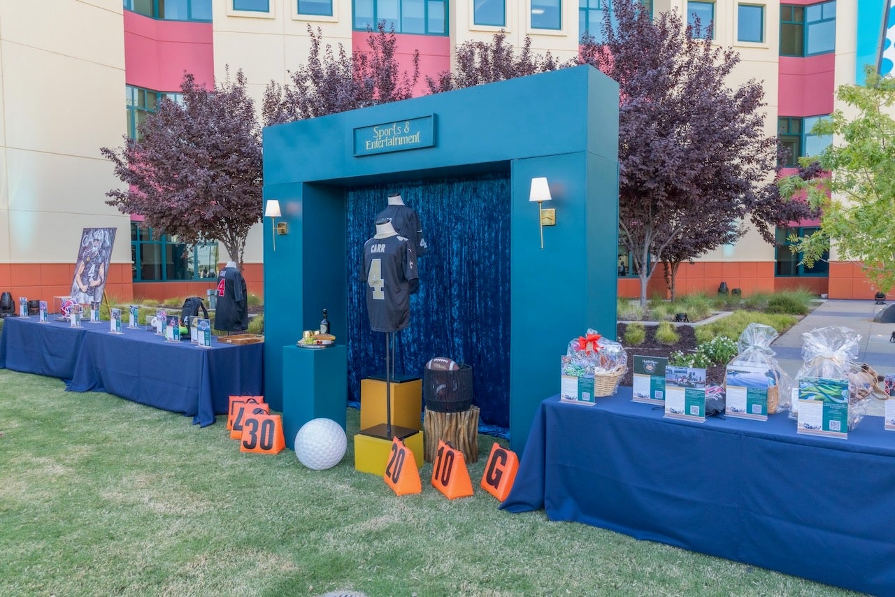 silent auction area with sports memorabilia