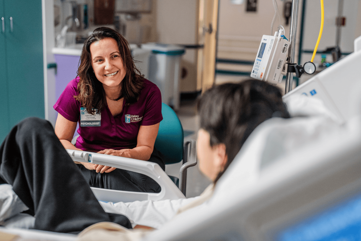 Valley Children's psychologist Dr. Katie Zaki talks with a patient