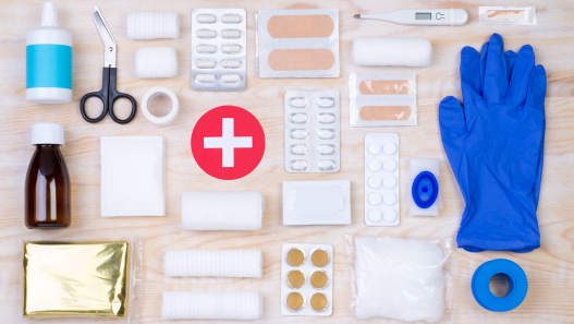Variety of first-aid items laid out on a counter 