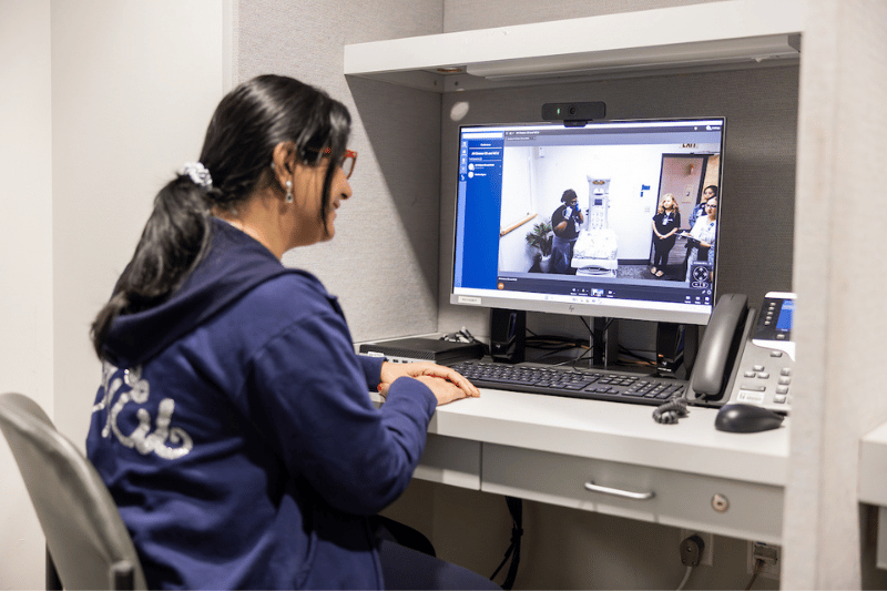 A Valley Children's neonatologist attends to a patient via telenursey capabilities