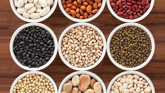 Variety of beans in several bowls 